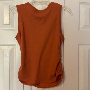 Women’s size small high neck tank.